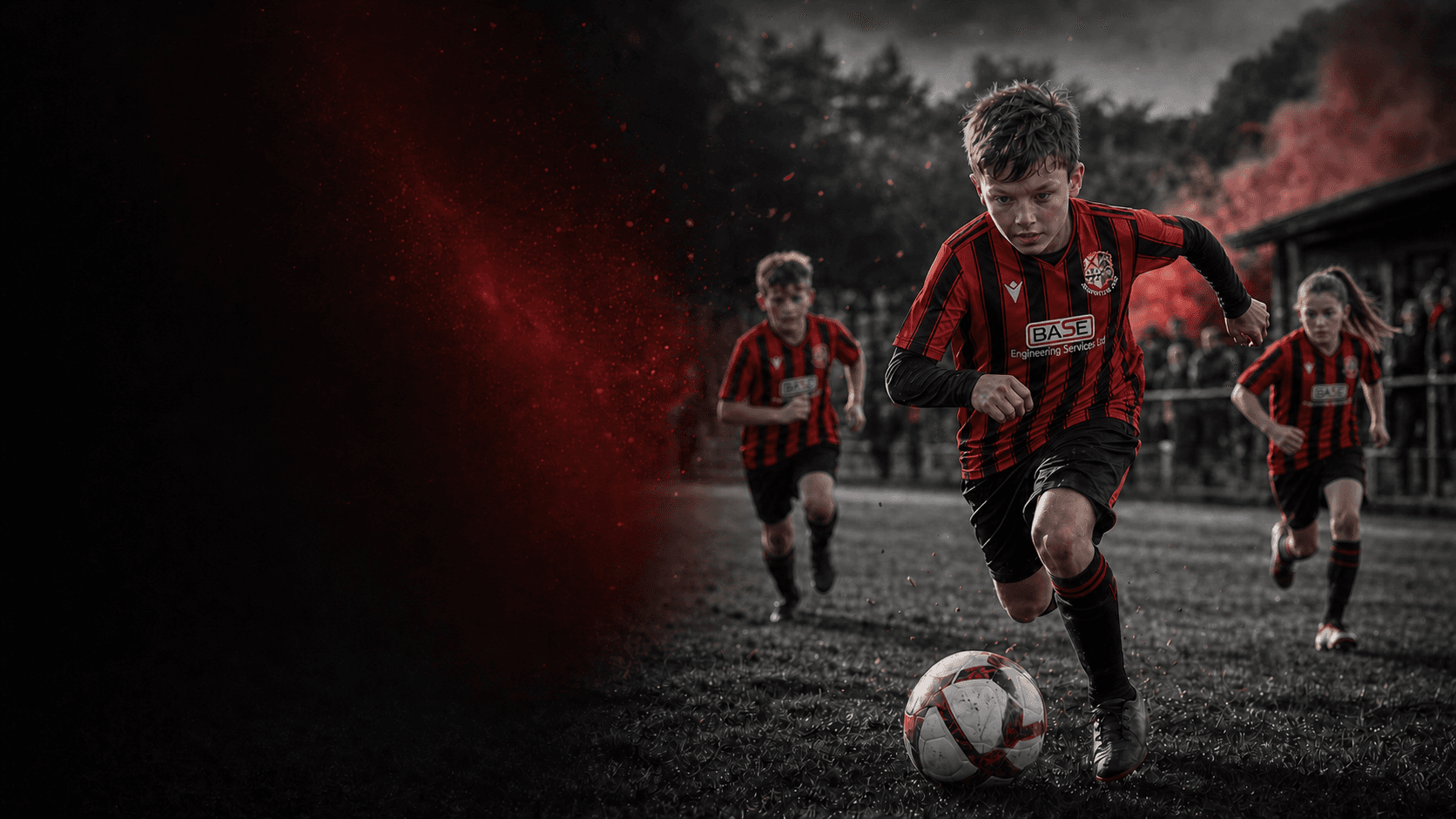 Adlington junior football players running with the ball